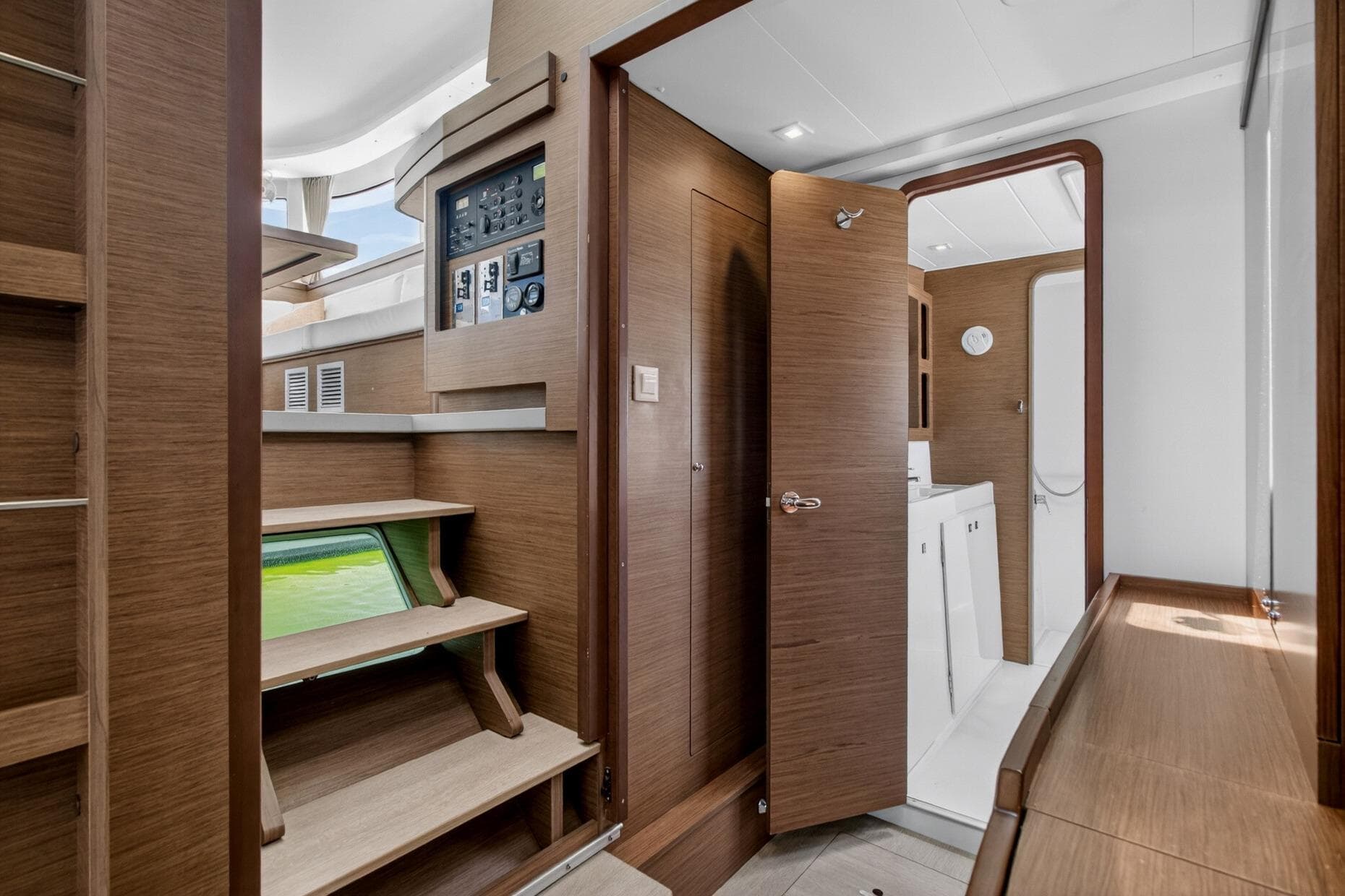 Interior of 2018 Lagoon 42 yacht featuring wooden finishes and modern amenities.