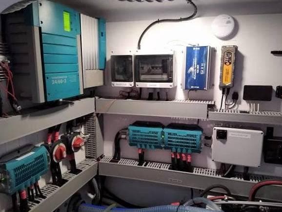 Electrical control panel with various components, including Black Pepper Code 2.1 model, 2019.