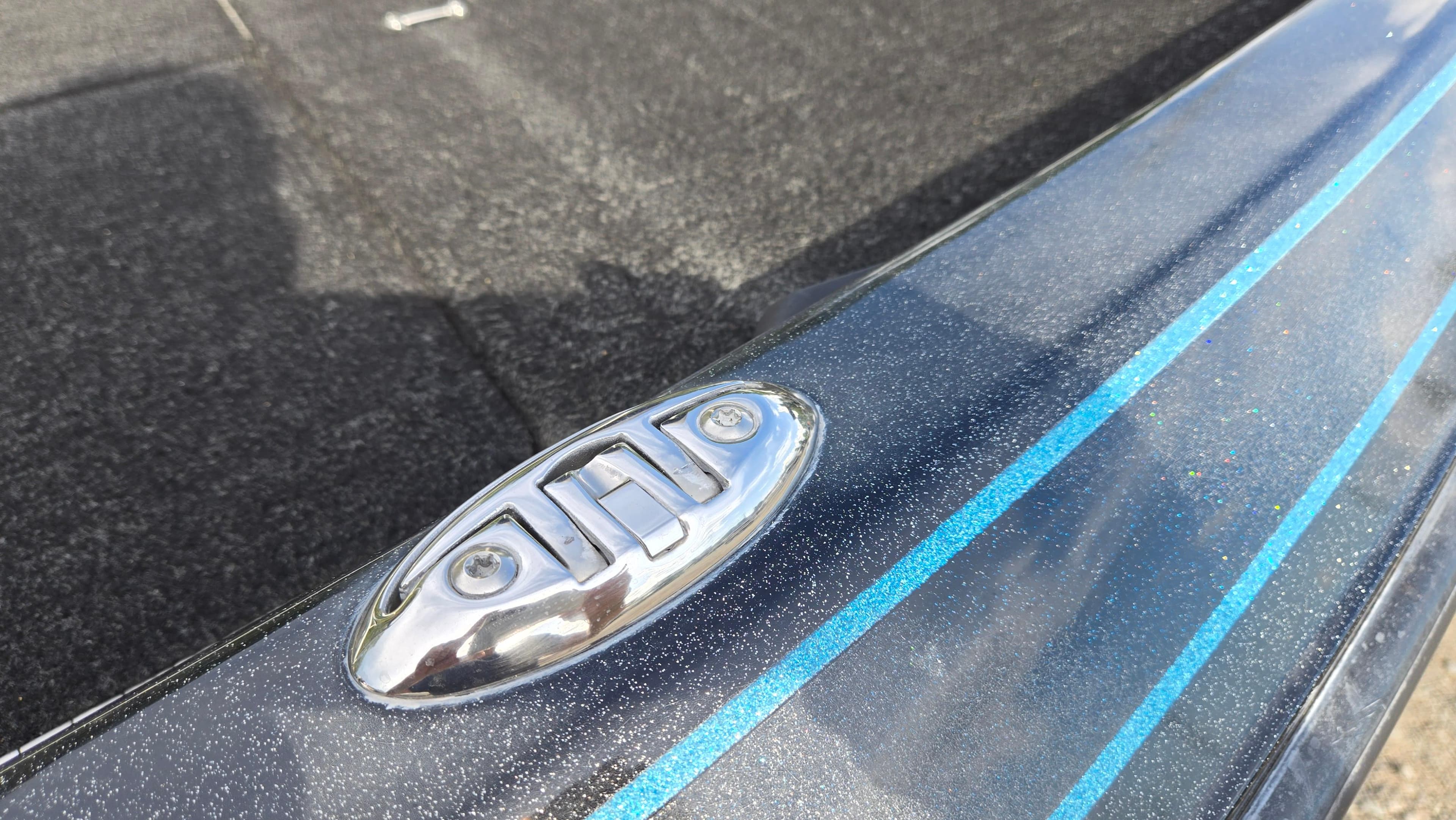 2017 Skeeter ZX 250 boat deck with metallic finish and blue stripe detailing.