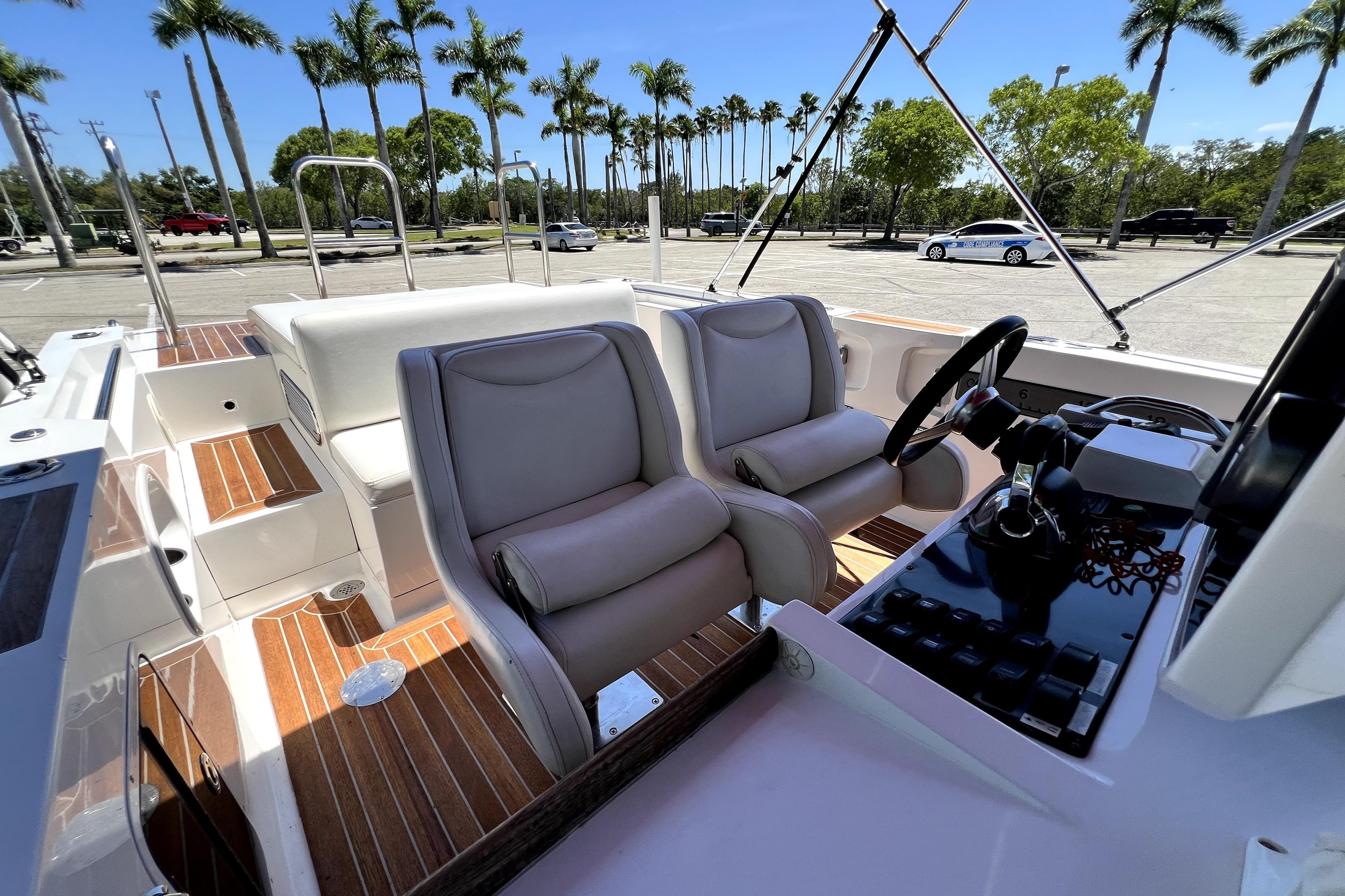 2013 Novurania Chase 23 boat interior with plush seating and modern controls.