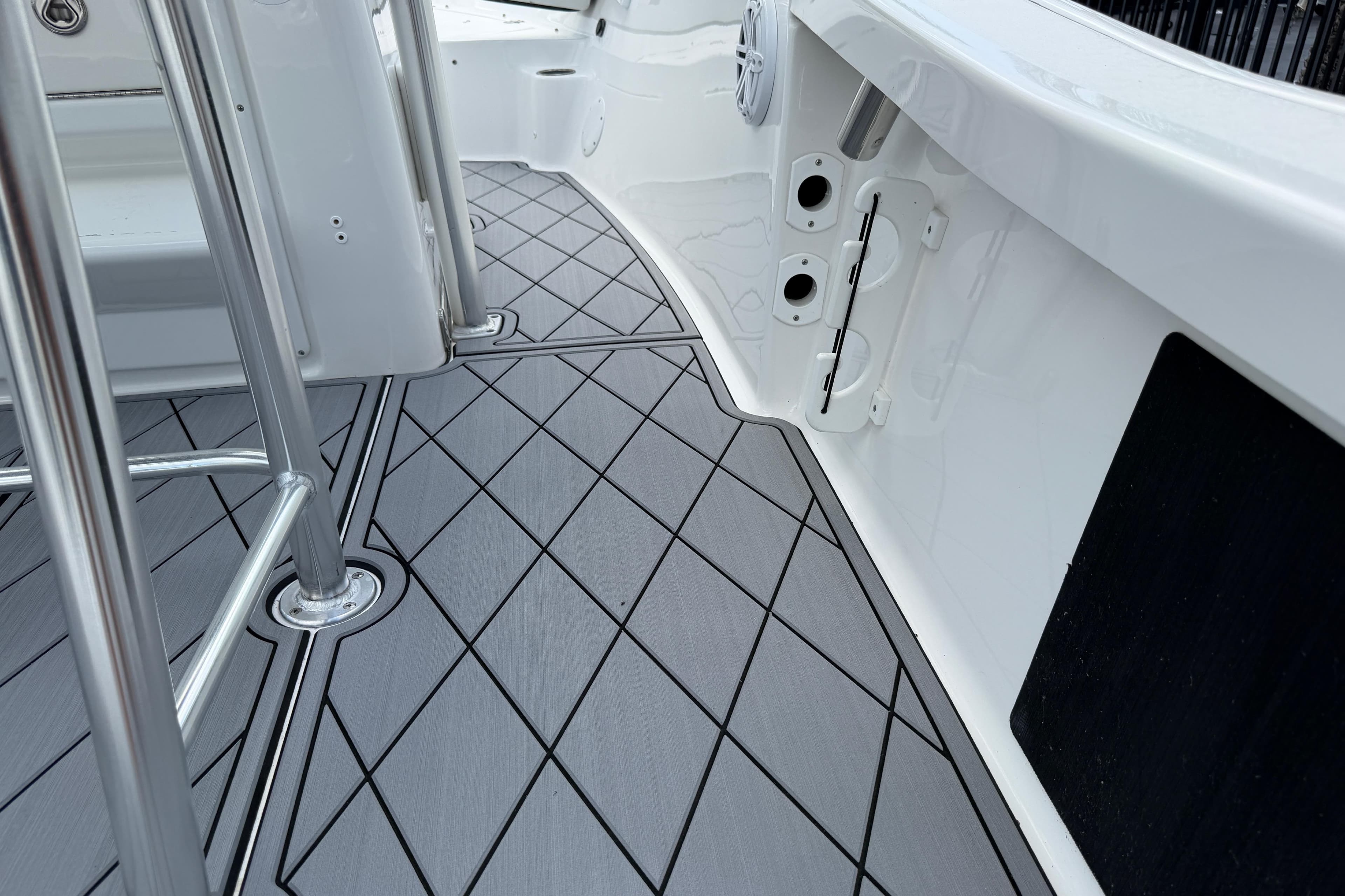 2023 Tidewater 198 CC Adventure boat deck with sleek, modern design and durable flooring.