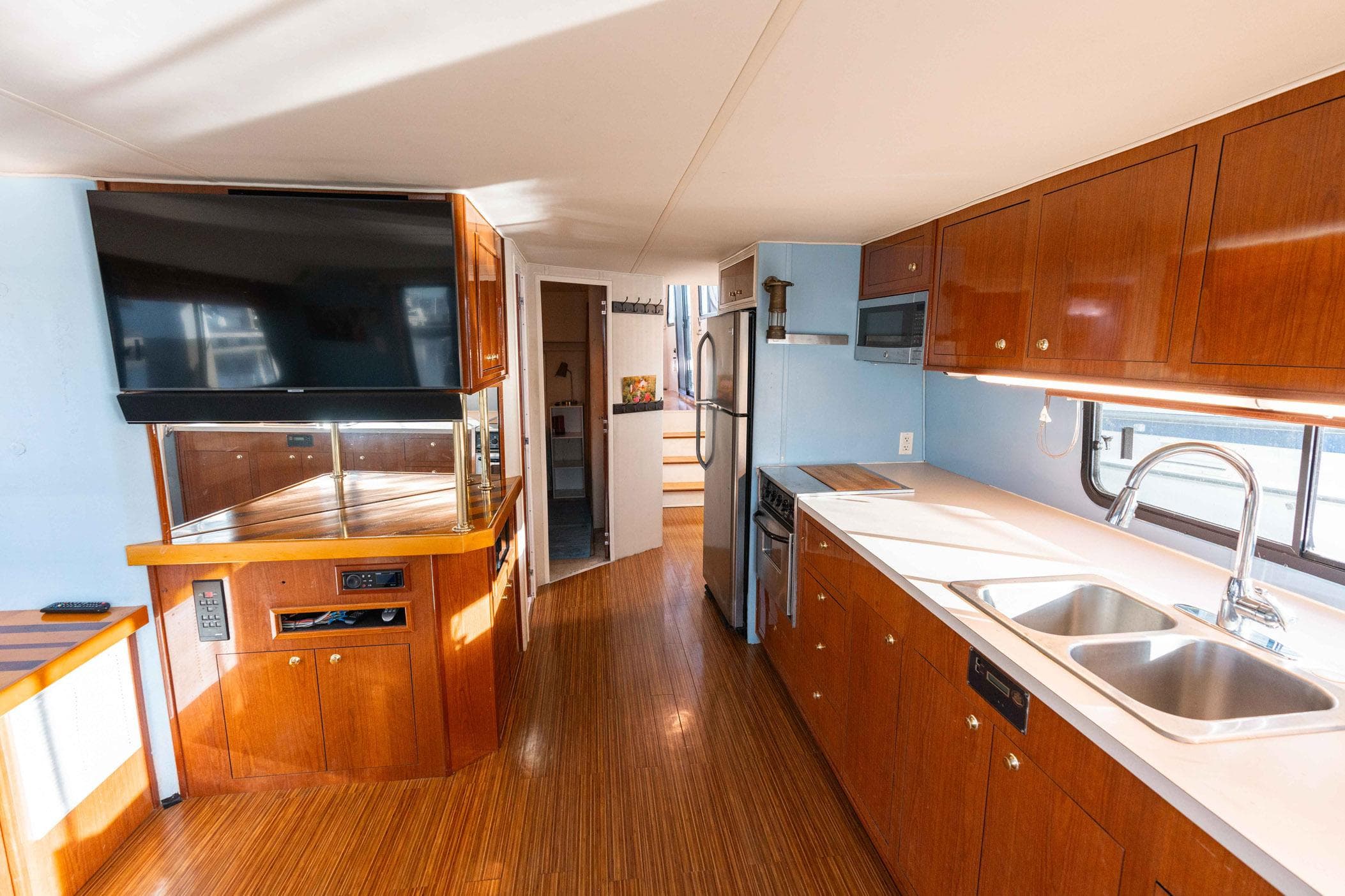 Luxurious kitchen interior of 2001 Harbor Master 520 Coastal yacht with modern amenities.