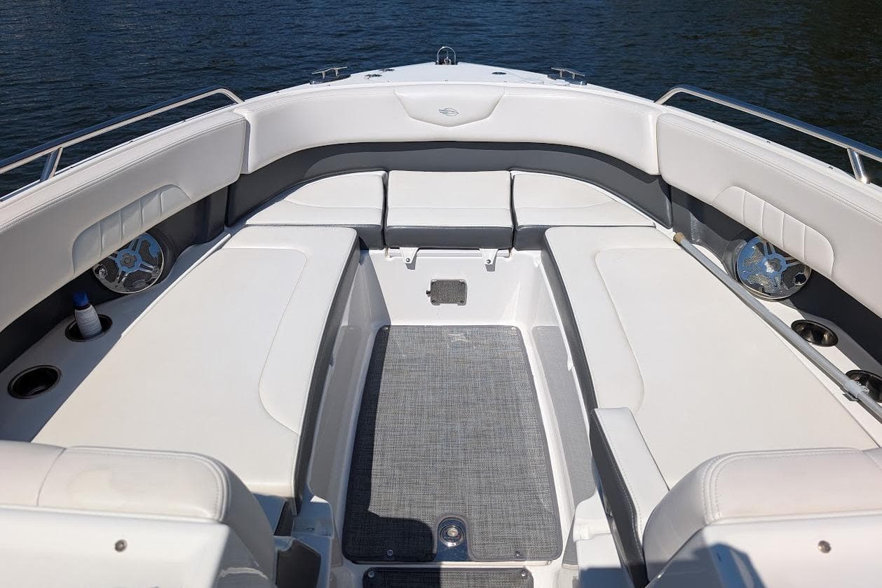 2016 Chaparral 307 SSX boat interior with spacious seating and cup holders.