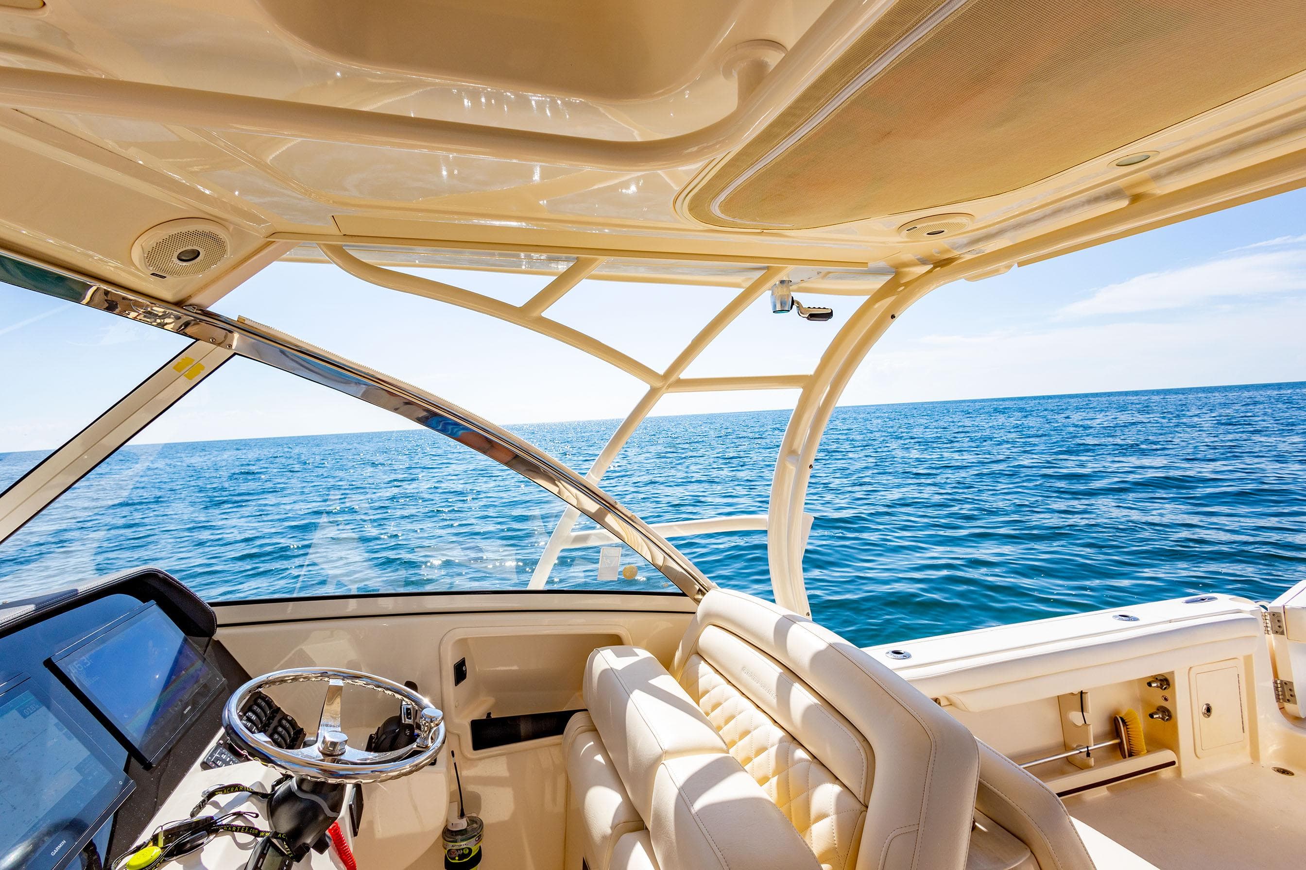 Interior view of 2018 Grady-White Freedom 335 boat on open water.