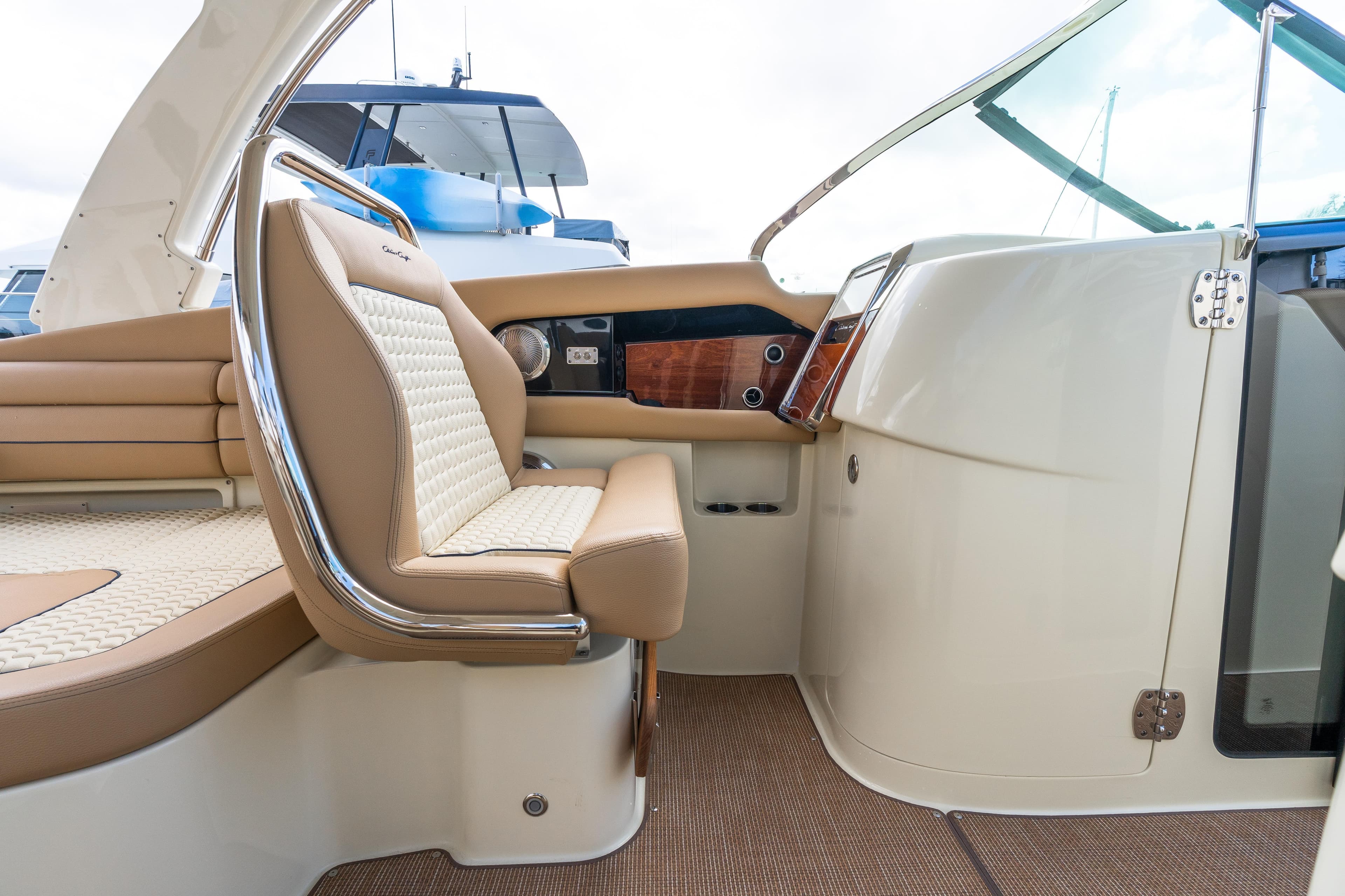 2025 Chris-Craft Launch 35 GT interior with luxurious seating and elegant dashboard design.