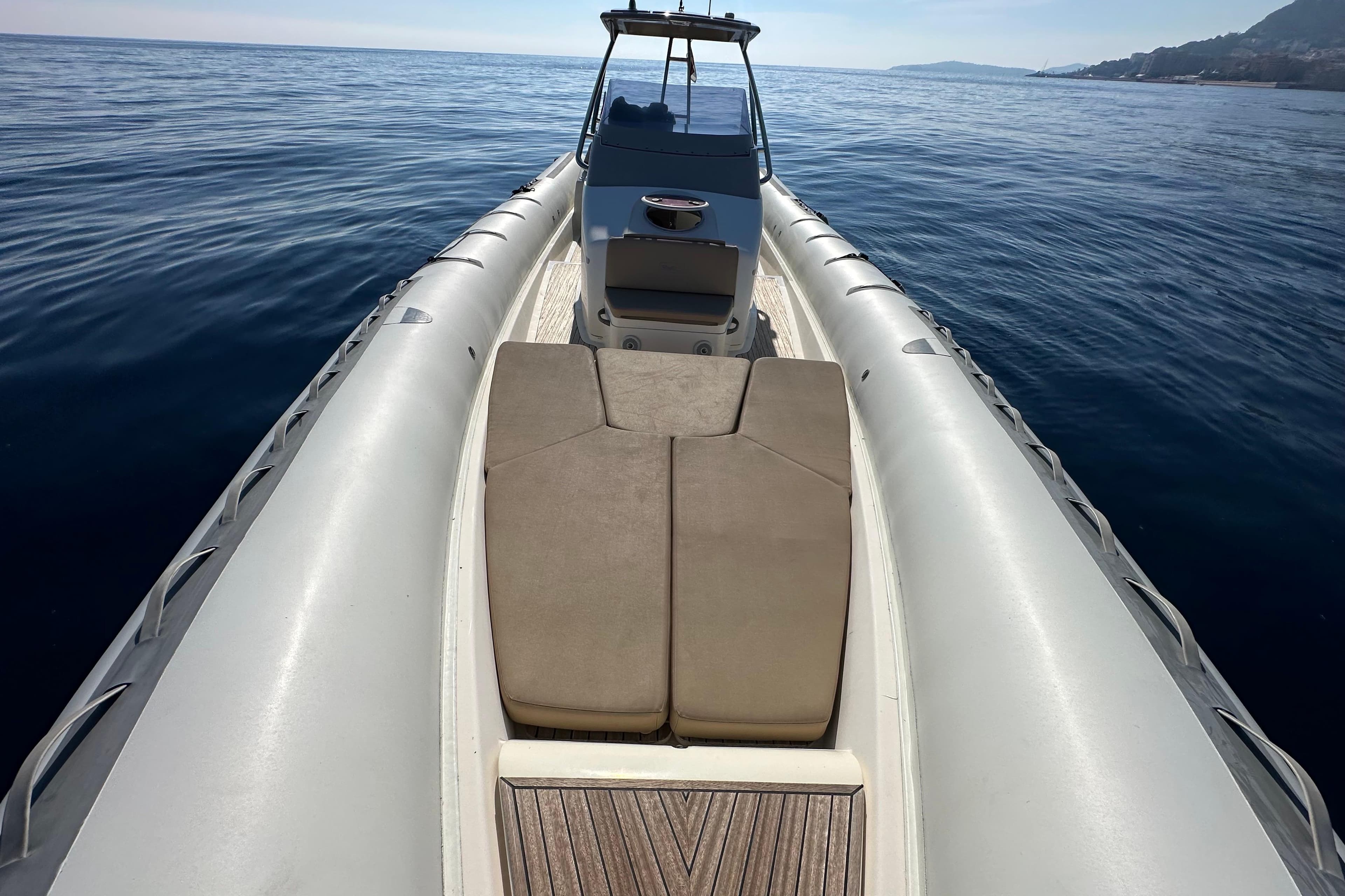 BWA 44 boat from 2006 on calm sea, featuring spacious deck and seating.