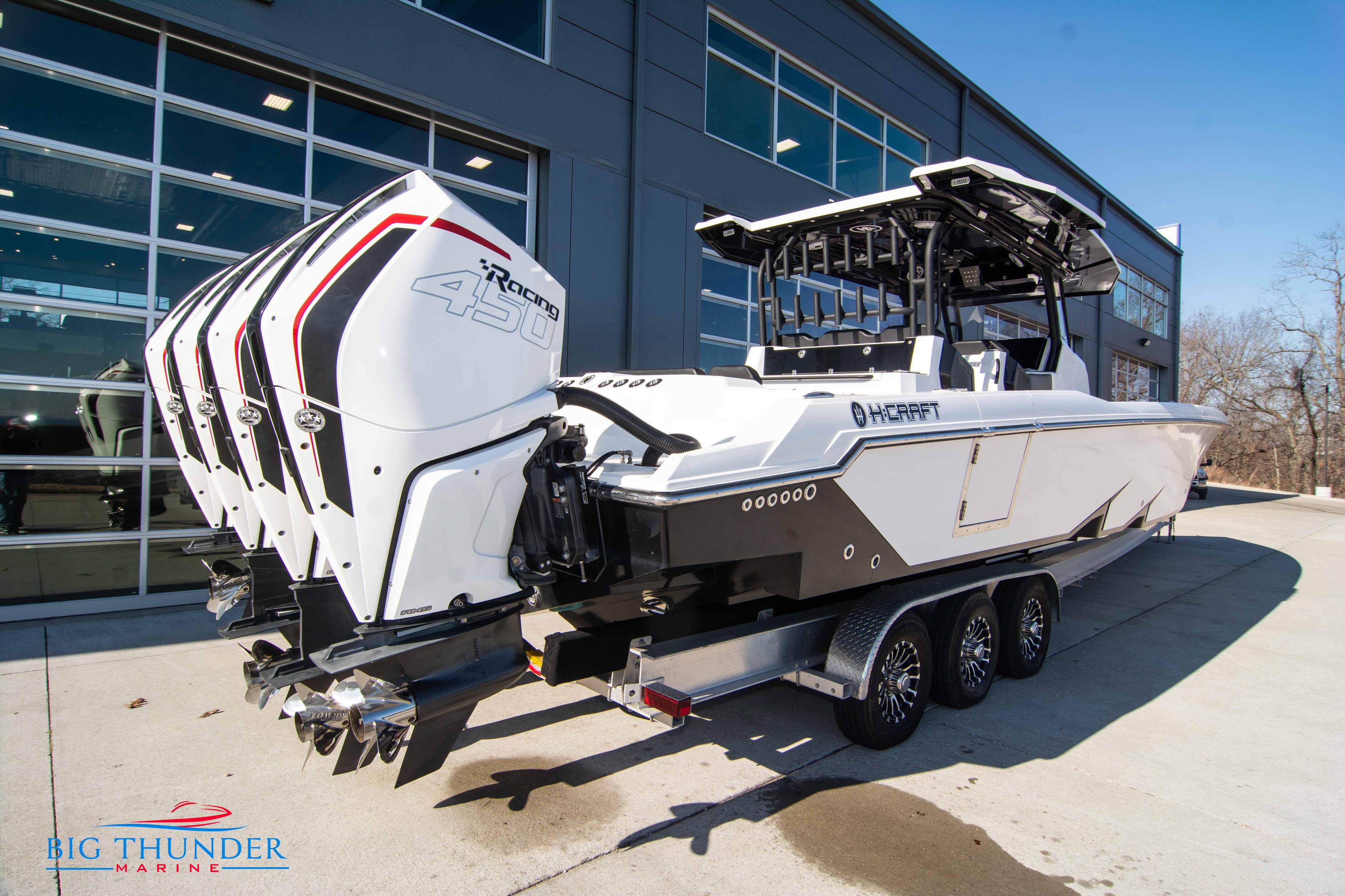 2023 Hayaari Marine H44Z boat with quad engines on a trailer.