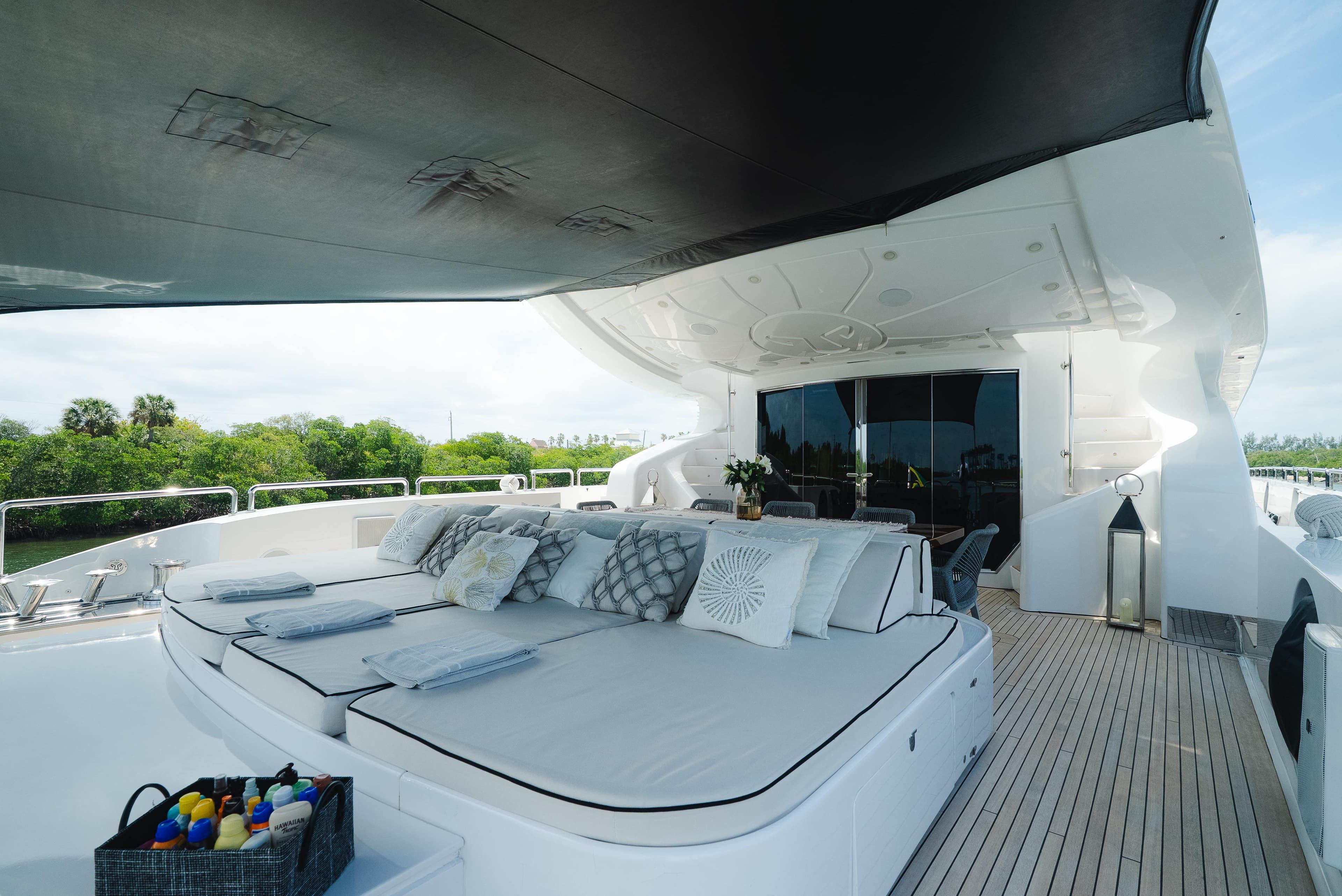 Luxurious 2010 Arno Leopard 46 yacht deck with sun loungers and elegant decor.