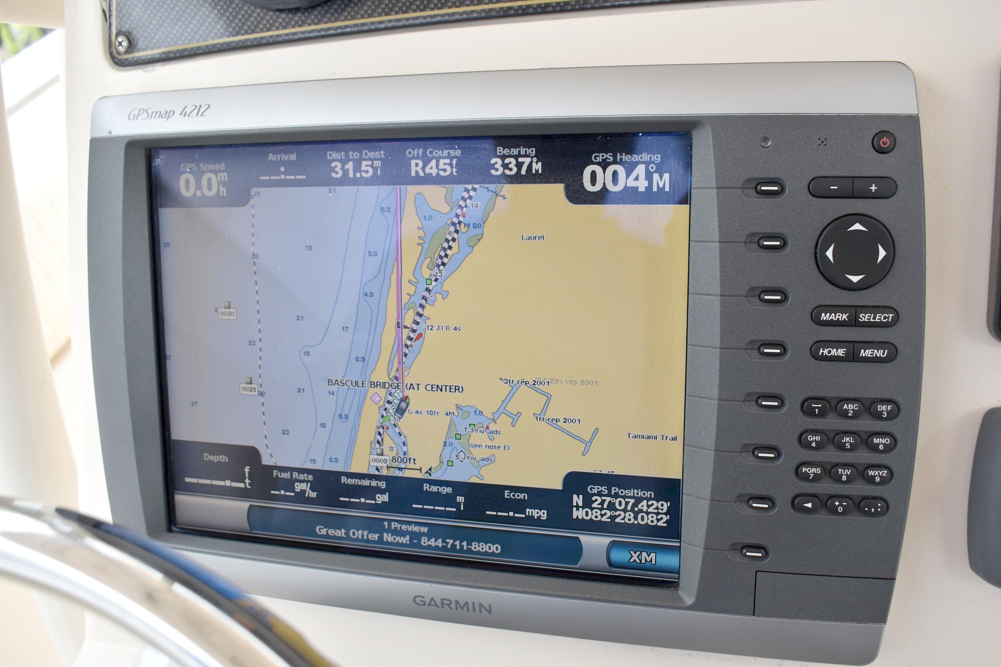 Garmin GPSmap 4212 display on 2012 Grady-White Canyon 271 boat, showing navigation details.