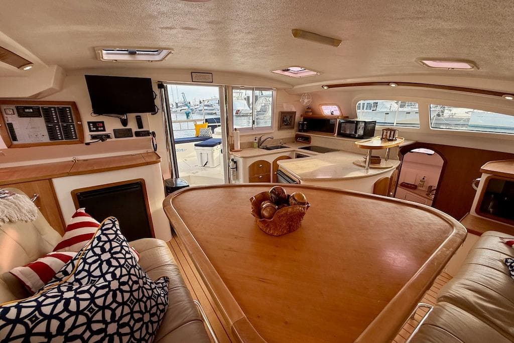 Luxurious interior of 2006 Island Spirit 401 yacht with modern amenities and cozy seating.