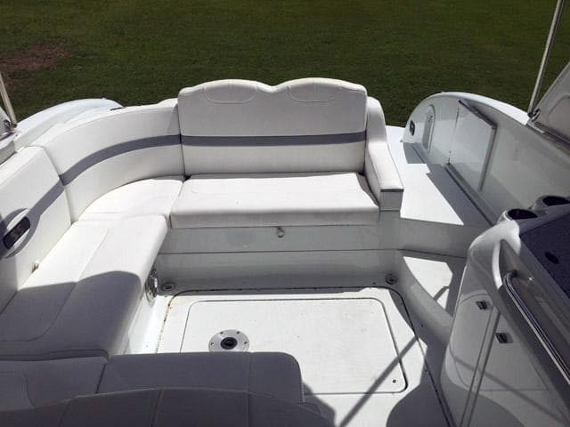 2008 Formula 310 Sun Sport boat interior with white seating and spacious layout.