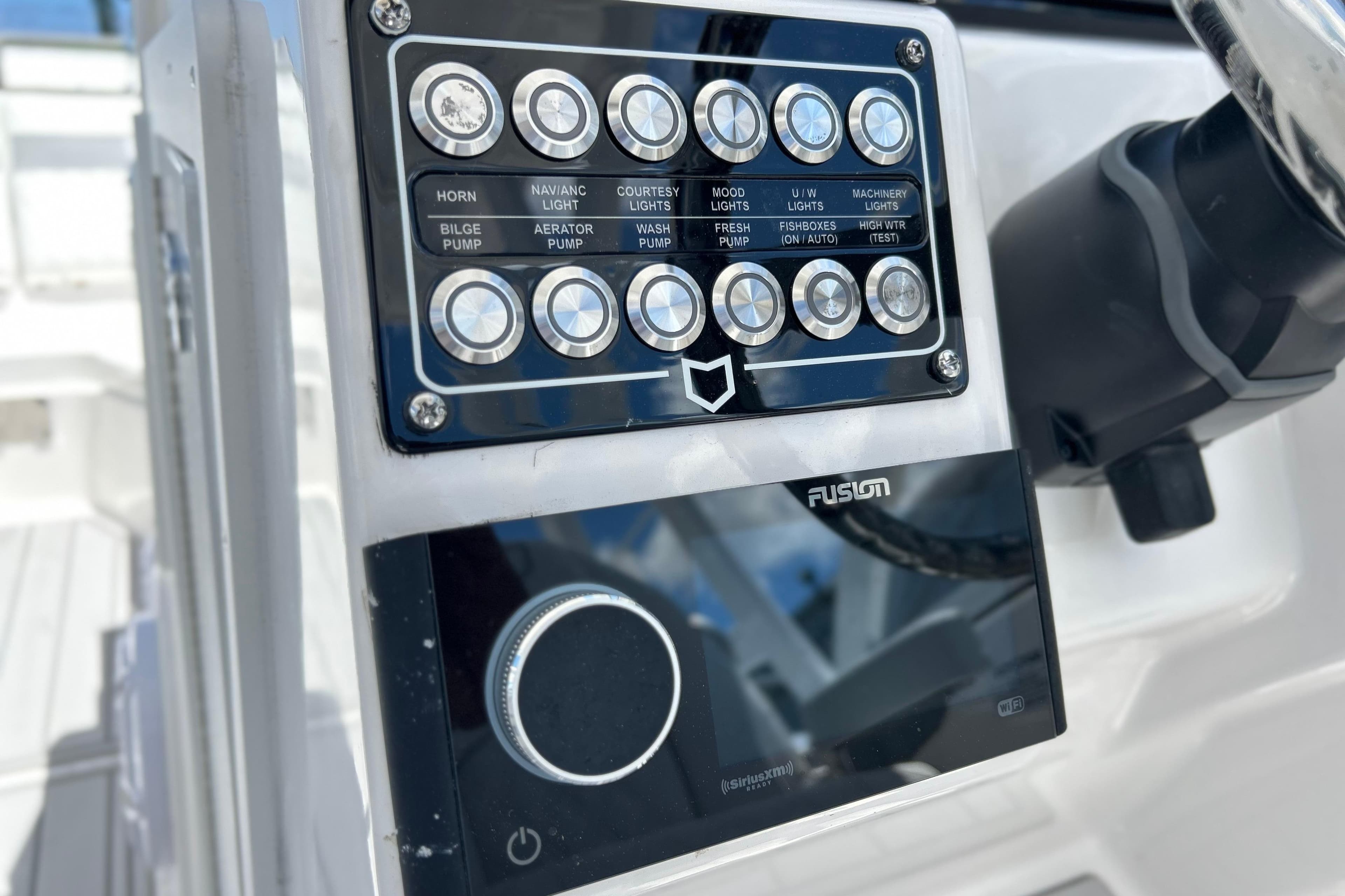 Control panel of 2026 Sea Fox 288 Traveler boat with various function buttons.