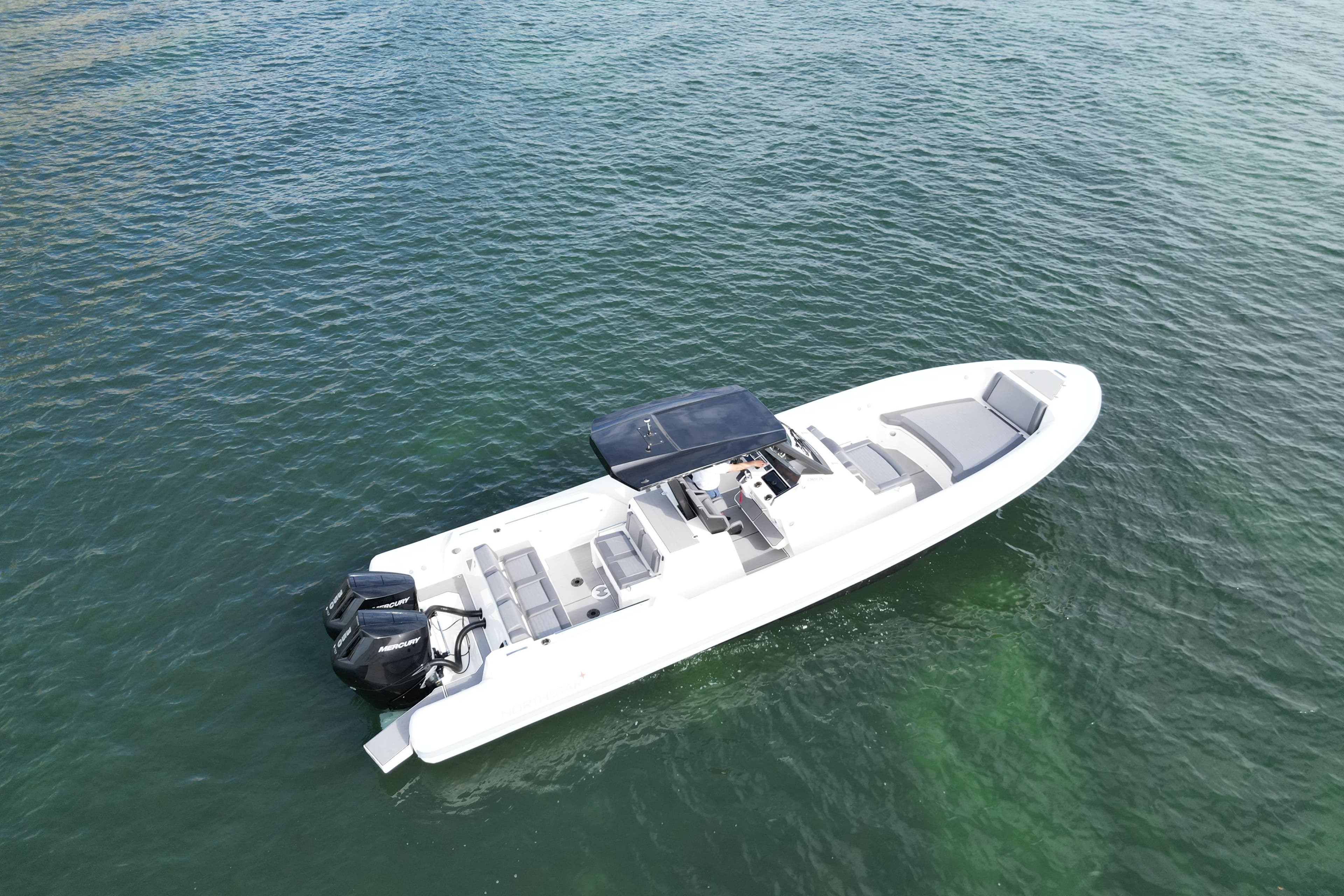 Aerial view of 2026 Northstar ORION 10 boat on calm water.