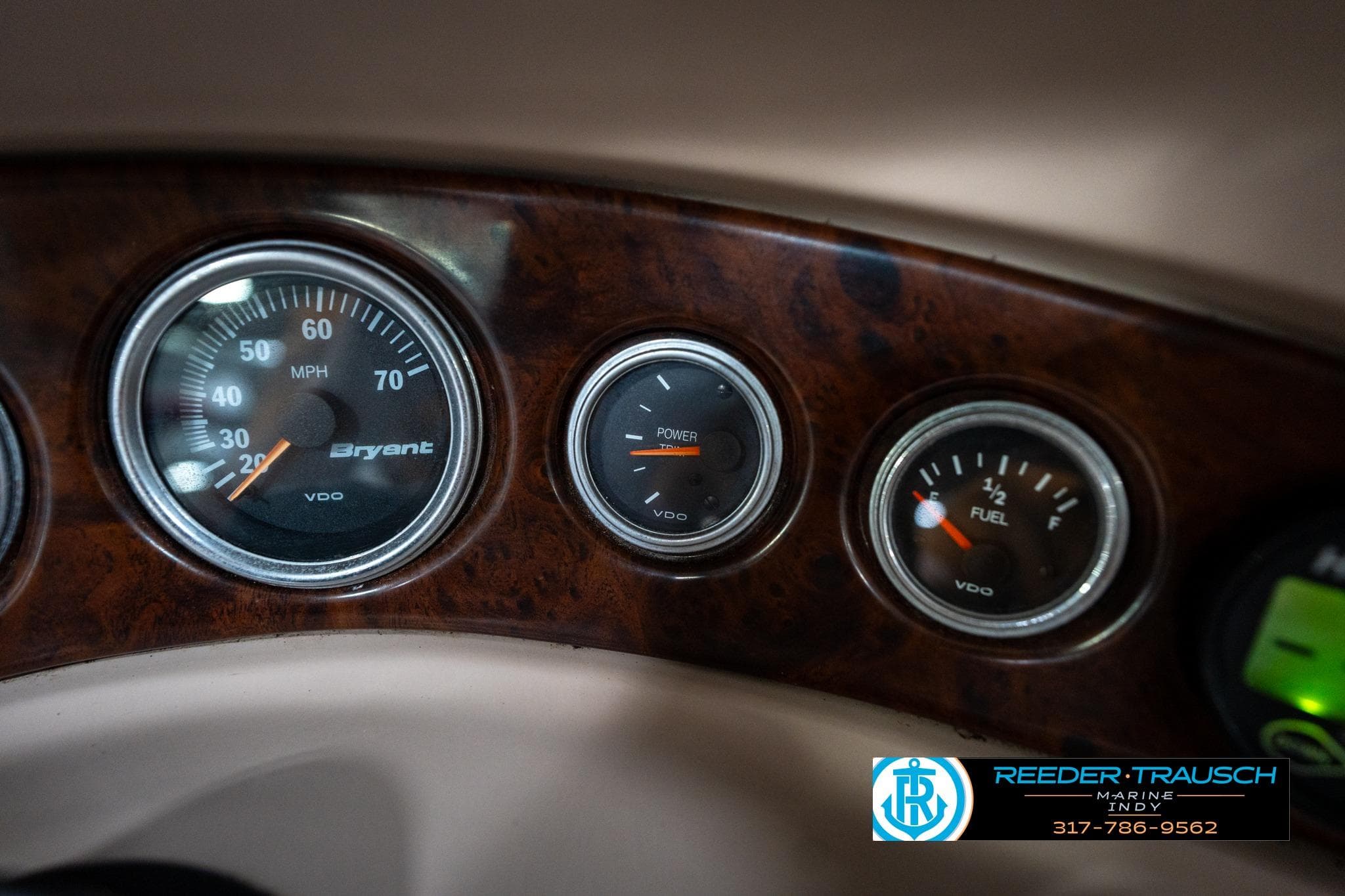 Dashboard gauges of a 2000 Bryant 196 Limited boat, featuring speedometer and fuel indicators.