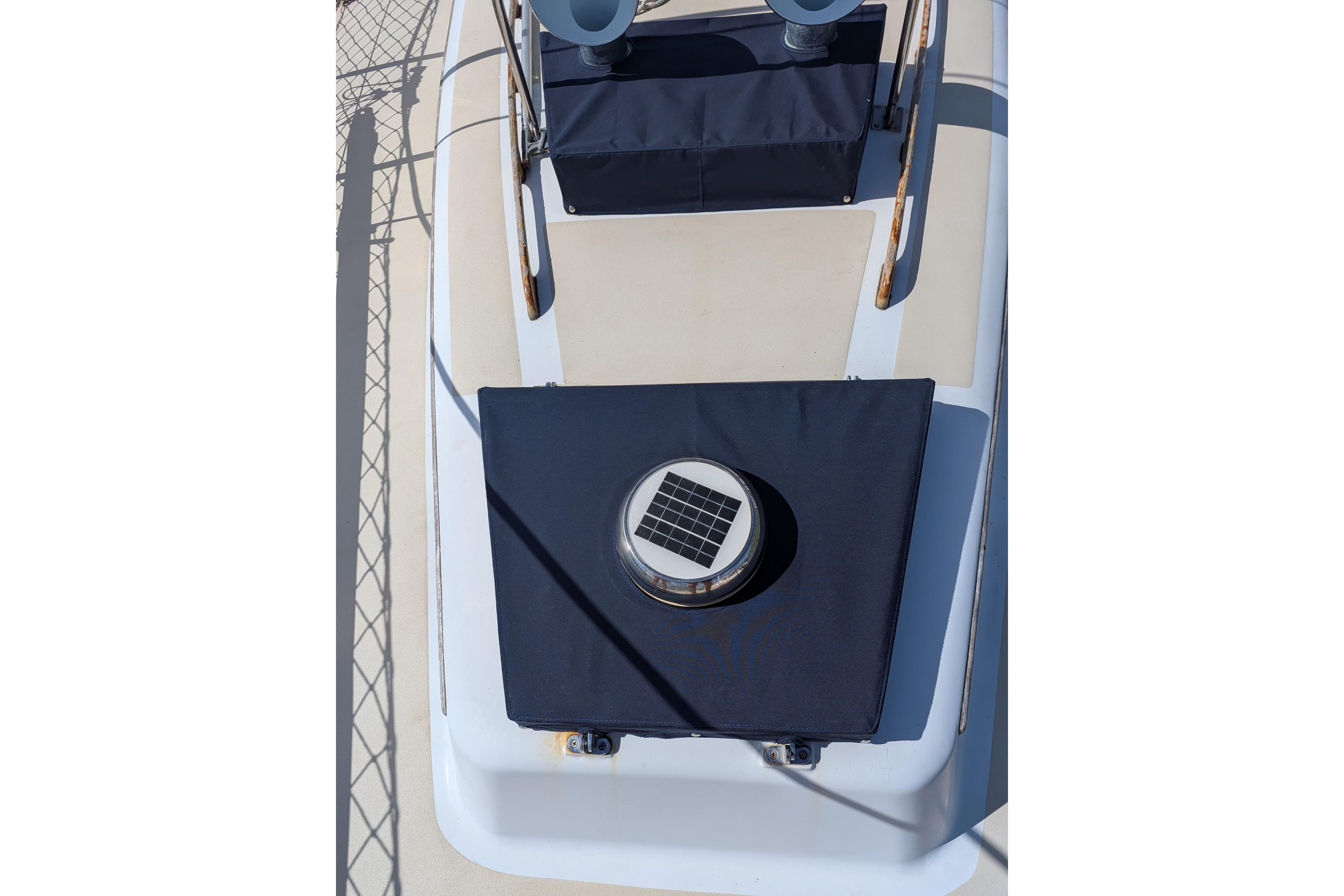 1974 Hinckley 49 yacht deck with solar panel and protective covers.