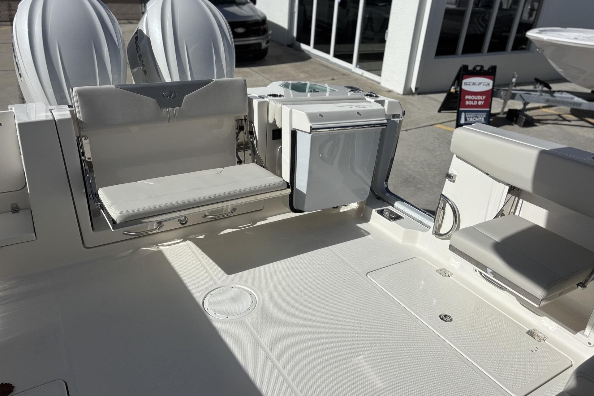 2026 Sailfish 316 DC boat interior with seating and storage compartments.