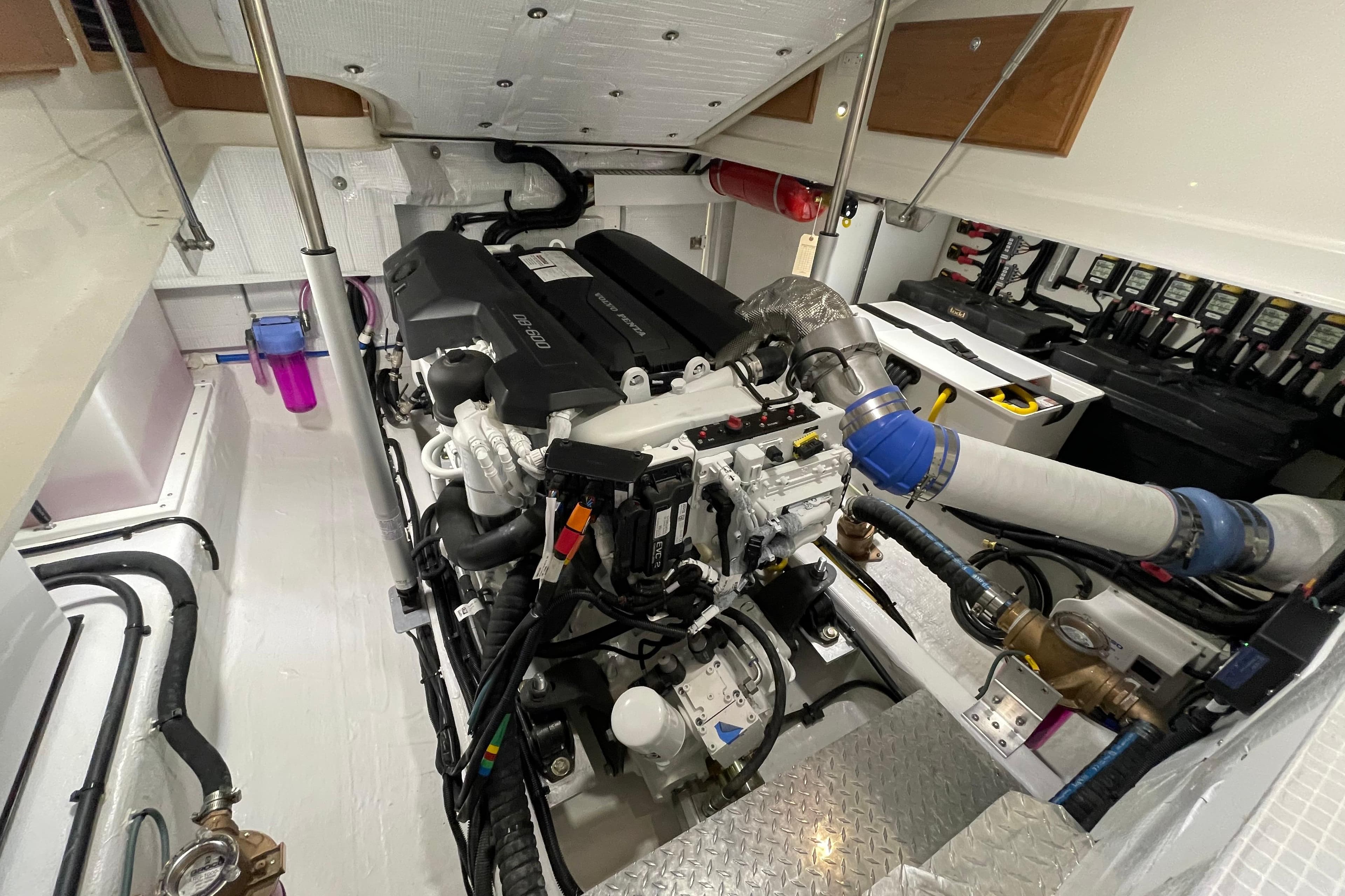 Engine room of 2026 Back Cove 372 boat, showcasing modern mechanical components.