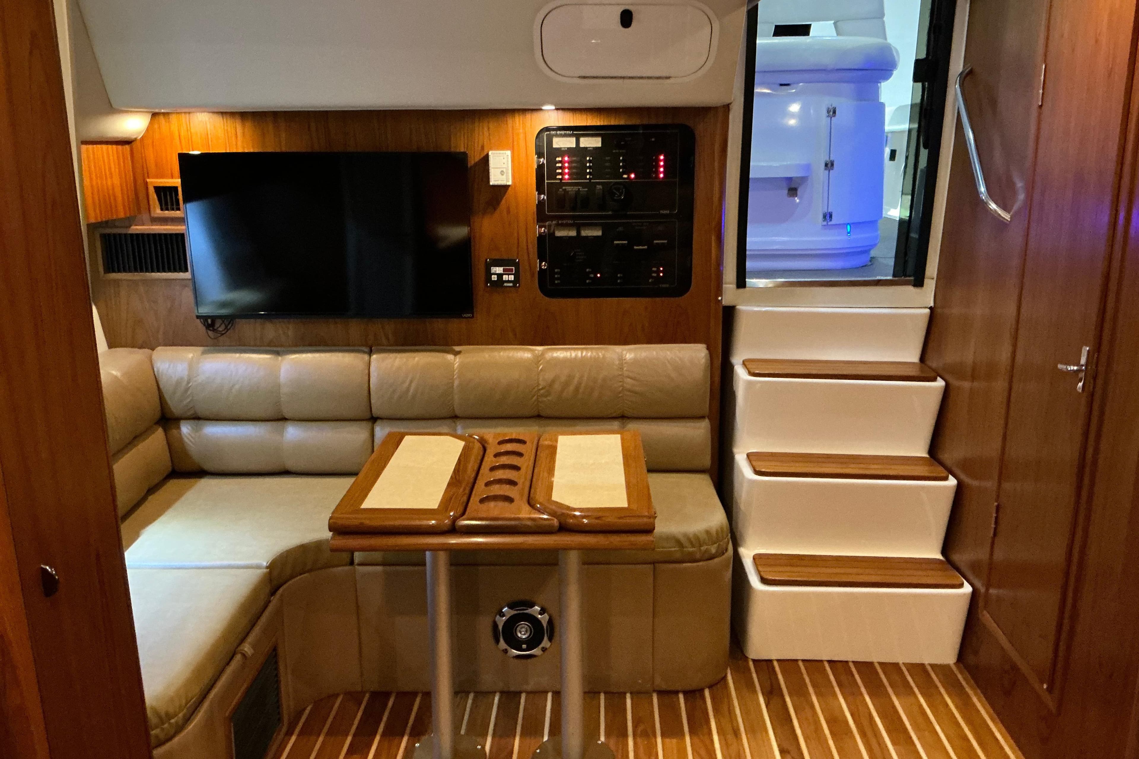Interior of 2000 Tiara Yachts 3500 Express with leather seating and modern amenities.