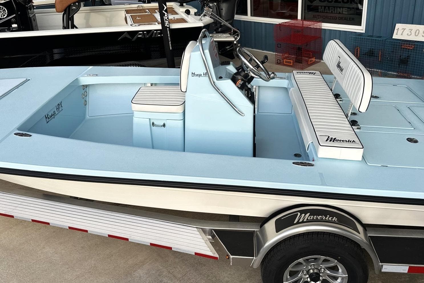 2024 Maverick 18 HPX-V boat with sleek design and comfortable seating on a trailer.