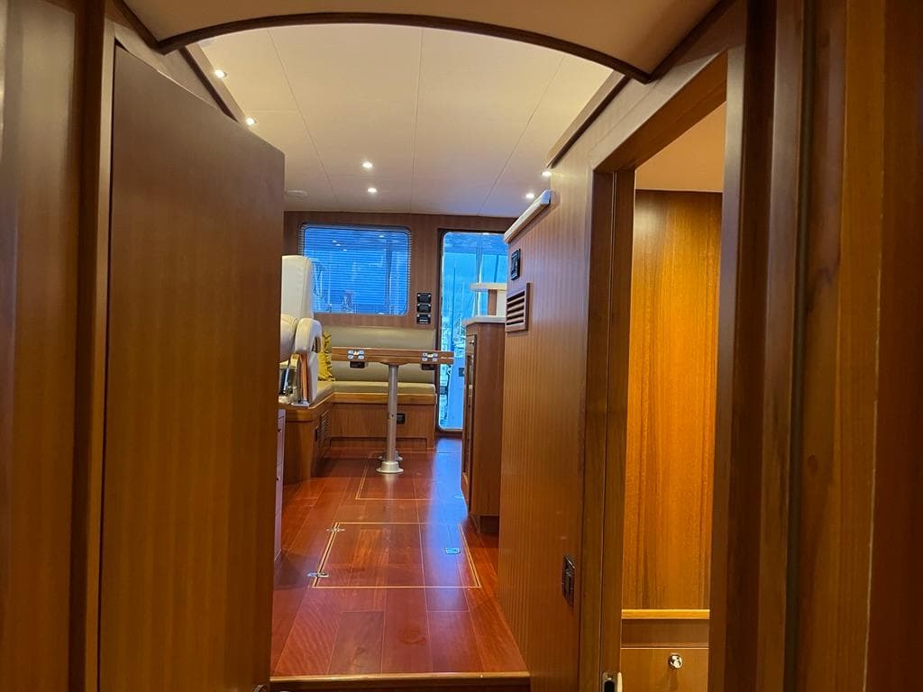 Interior of 2025 Bracewell 41 yacht with wooden finishes and modern design.